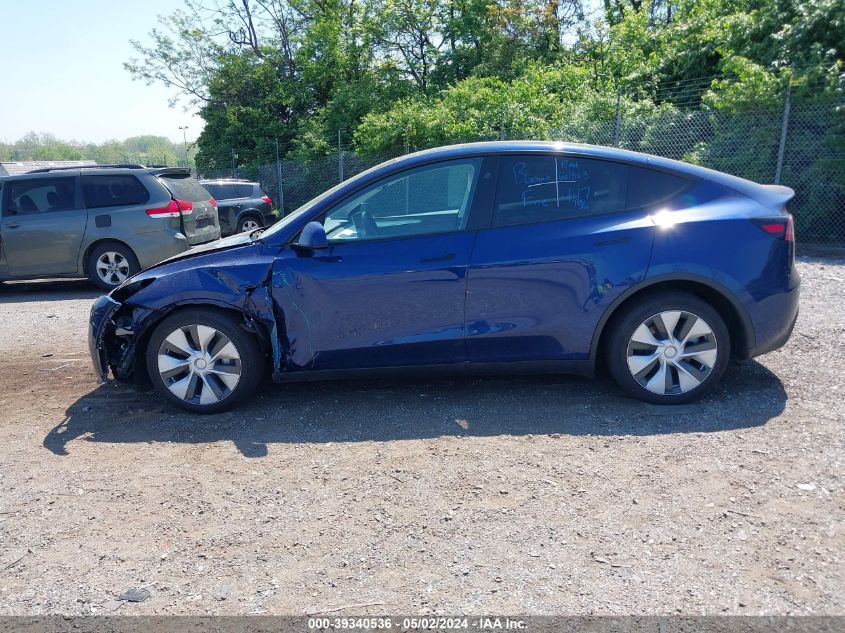 2023 Tesla Model Y Awd/Long Range Dual Motor All-Wheel Drive VIN: 7SAYGDEE5PA165354 Lot: 39340536