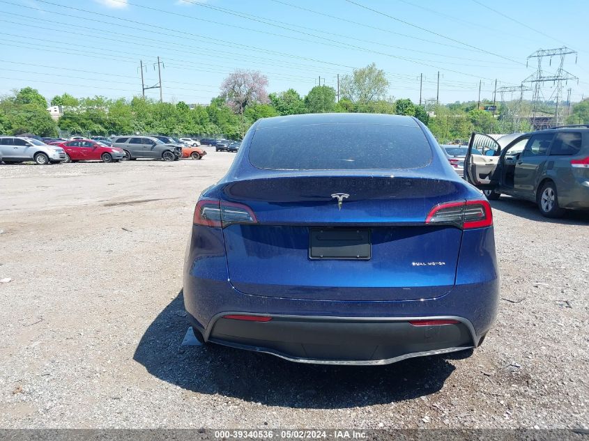 2023 Tesla Model Y Awd/Long Range Dual Motor All-Wheel Drive VIN: 7SAYGDEE5PA165354 Lot: 39340536