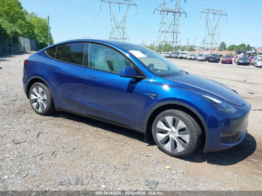 2023 Tesla Model Y Awd/Long Range Dual Motor All-Wheel Drive VIN: 7SAYGDEE5PA165354 Lot: 39340536