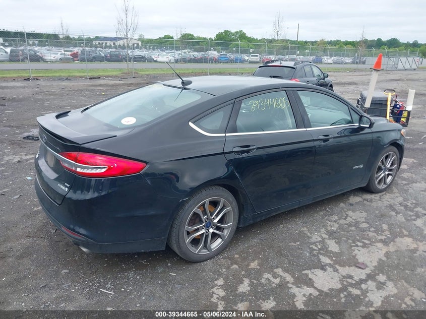 VIN 3FA6P0LUXHR217321 2017 FORD FUSION HYBRID SE