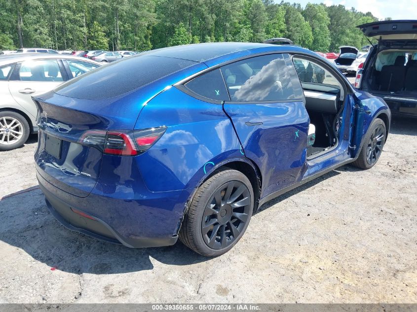 2023 Tesla Model Y Awd/Long Range Dual Motor All-Wheel Drive VIN: 7SAYGDEEXPA185275 Lot: 39350655