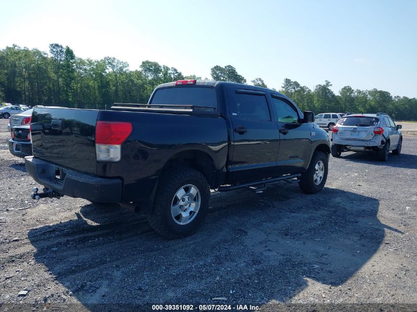 2012 Toyota Tundra Grade 5.7L V8 VIN: 5TFEY5F1BCCX12559 Lot: 39351092