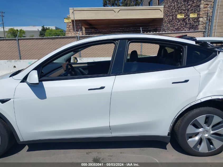 2023 Tesla Model Y Awd/Long Range Dual Motor All-Wheel Drive VIN: 7SAYGDEE7PF864472 Lot: 39353041