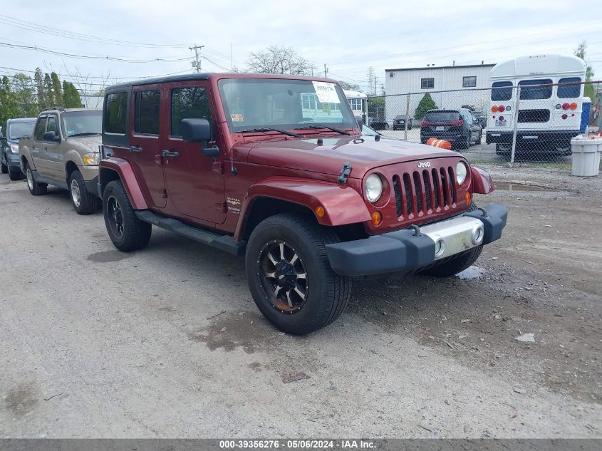 2009 Jeep Wrangler Unlimited Sahara VIN: 1J8GA59179L773380 Lot: 39356276