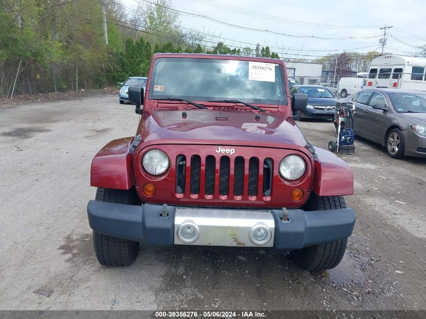 2009 Jeep Wrangler Unlimited Sahara VIN: 1J8GA59179L773380 Lot: 39356276