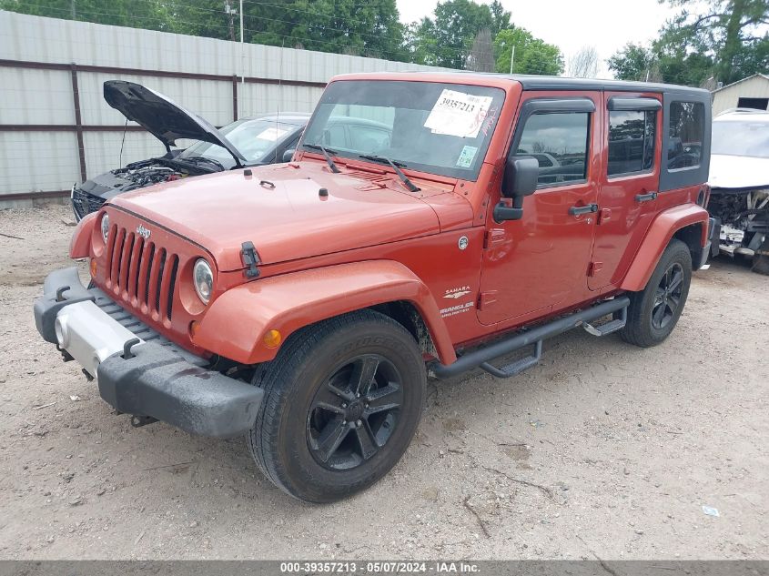 2009 Jeep Wrangler Unlimited Sahara VIN: 1J4GA59139L754147 Lot: 39357213