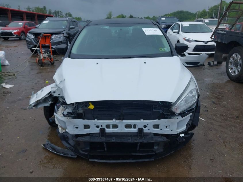 2015 Ford Focus S VIN: 1FADP3E22FL382327 Lot: 39357487
