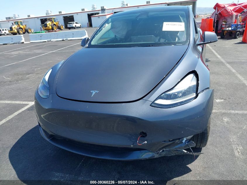 2023 Tesla Model Y Awd/Long Range Dual Motor All-Wheel Drive VIN: 7SAYGDEE2PF919359 Lot: 39360226