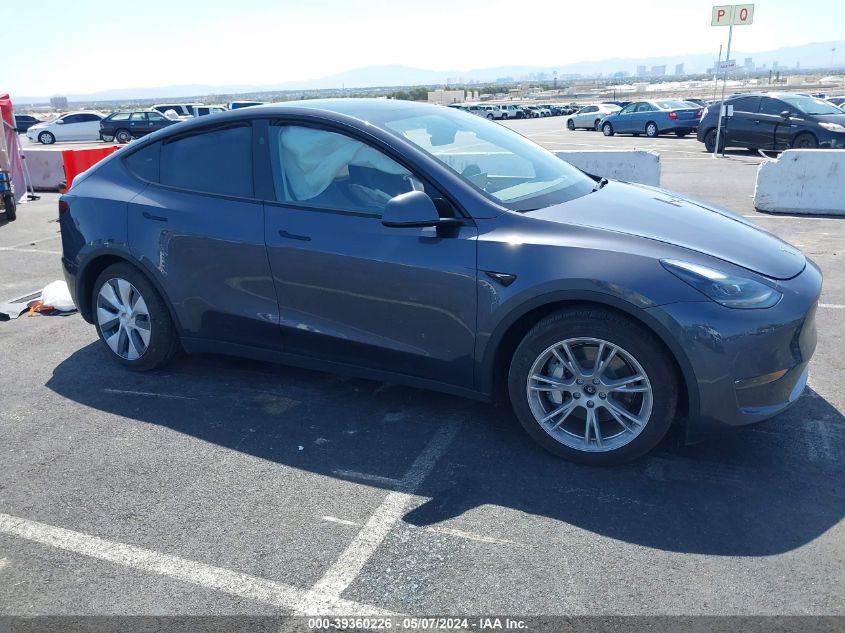 2023 Tesla Model Y Awd/Long Range Dual Motor All-Wheel Drive VIN: 7SAYGDEE2PF919359 Lot: 39360226