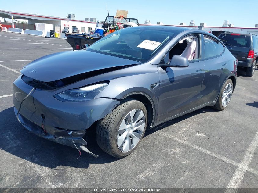 2023 Tesla Model Y Awd/Long Range Dual Motor All-Wheel Drive VIN: 7SAYGDEE2PF919359 Lot: 39360226