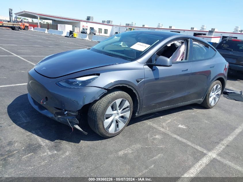 2023 Tesla Model Y Awd/Long Range Dual Motor All-Wheel Drive VIN: 7SAYGDEE2PF919359 Lot: 39360226