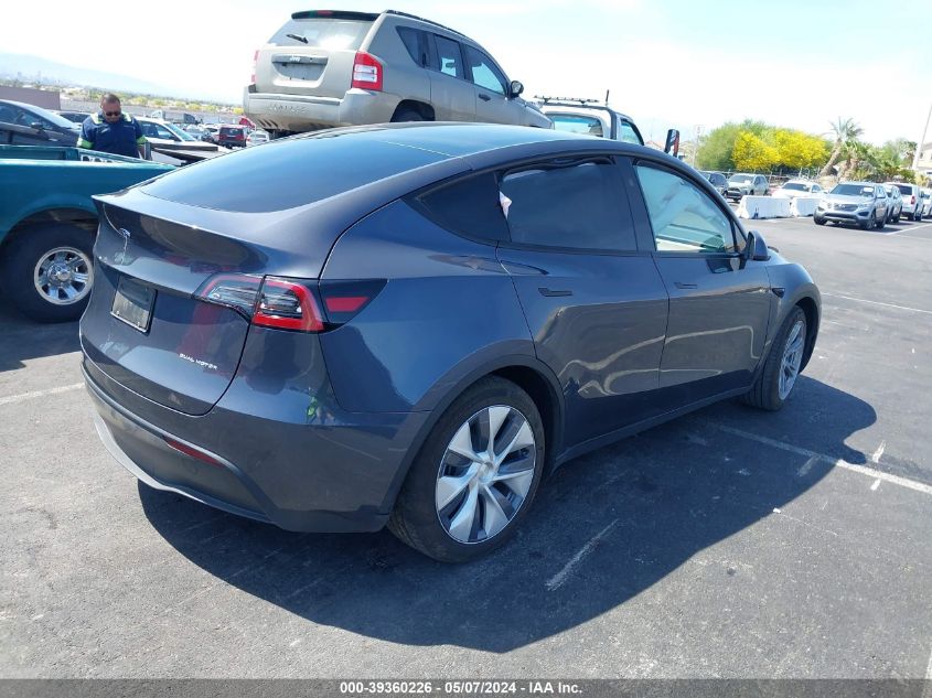 2023 Tesla Model Y Awd/Long Range Dual Motor All-Wheel Drive VIN: 7SAYGDEE2PF919359 Lot: 39360226