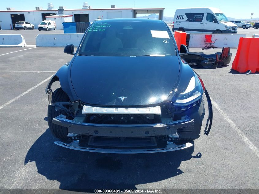 2023 Tesla Model Y Awd/Long Range Dual Motor All-Wheel Drive VIN: 7SAYGAEE9PF766445 Lot: 39360481