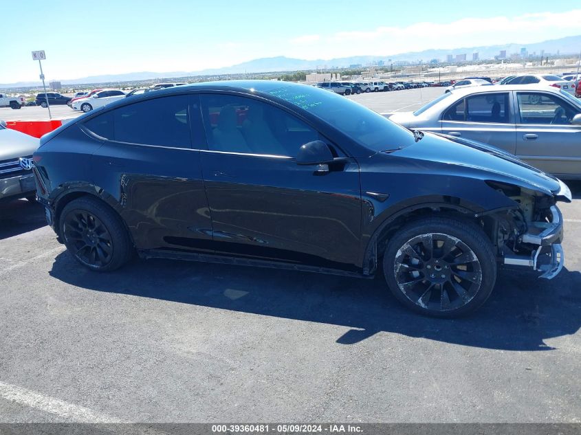 2023 Tesla Model Y Awd/Long Range Dual Motor All-Wheel Drive VIN: 7SAYGAEE9PF766445 Lot: 39360481