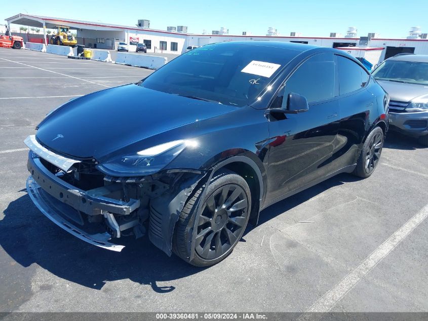 2023 Tesla Model Y Awd/Long Range Dual Motor All-Wheel Drive VIN: 7SAYGAEE9PF766445 Lot: 39360481