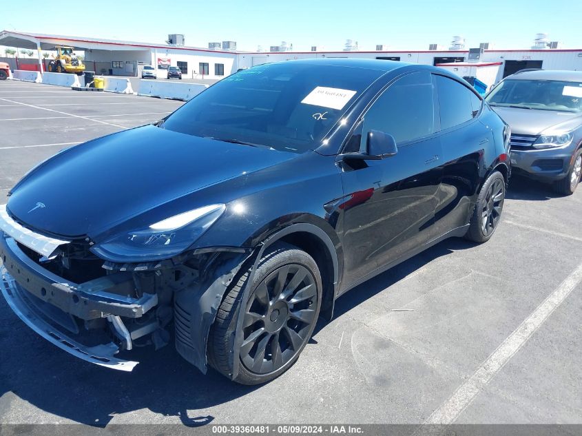 2023 Tesla Model Y Awd/Long Range Dual Motor All-Wheel Drive VIN: 7SAYGAEE9PF766445 Lot: 39360481