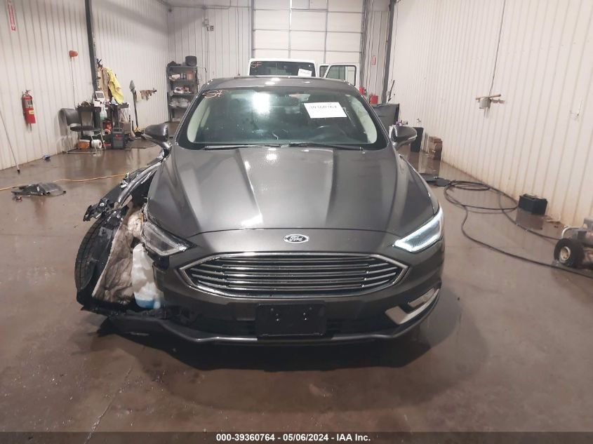 2017 Ford Fusion Hybrid Titanium VIN: 3FA6P0RU7HR368821 Lot: 39360764