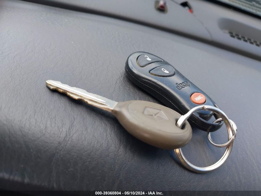 2000 Jeep Grand Cherokee Limited VIN: 1J4GW58N3YC207285 Lot: 39360804