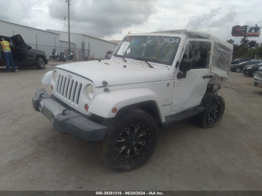 2011 Jeep Wrangler Sahara VIN: 1J4GA5D10BL575268 Lot: 39361318