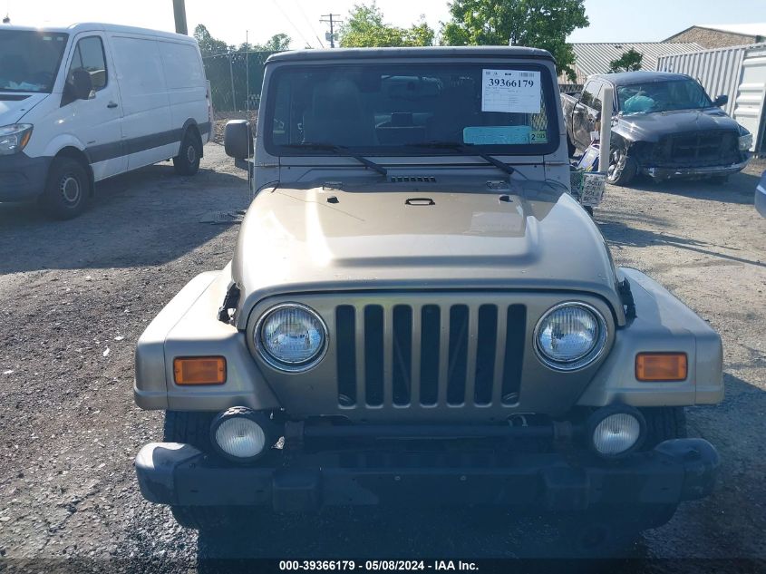 2003 Jeep Wrangler Sahara VIN: 1J4FA59S73P360431 Lot: 39366179