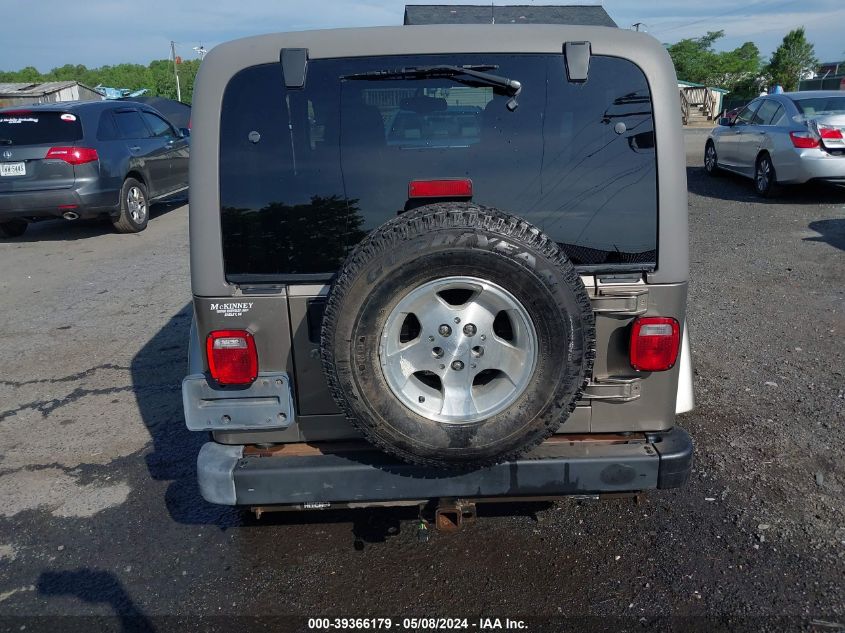 2003 Jeep Wrangler Sahara VIN: 1J4FA59S73P360431 Lot: 39366179