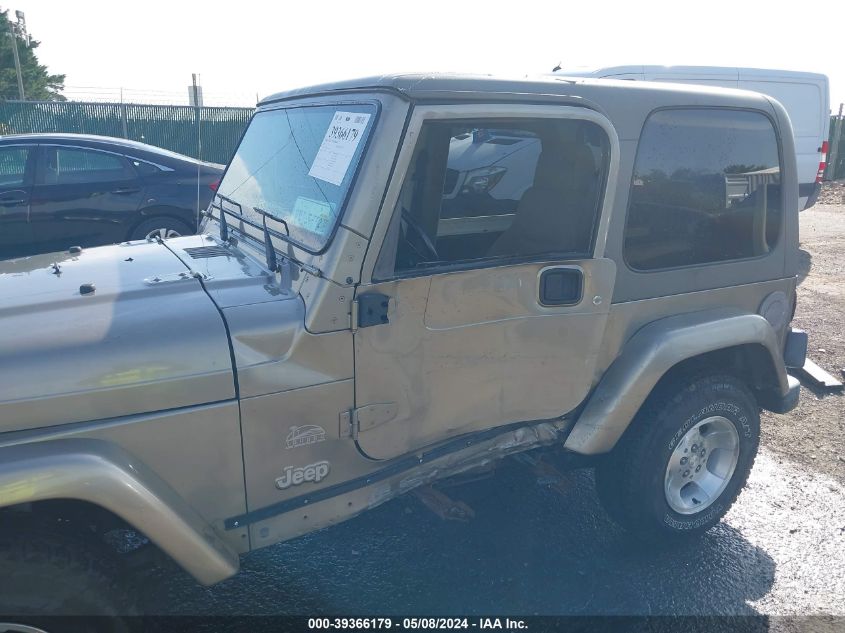 2003 Jeep Wrangler Sahara VIN: 1J4FA59S73P360431 Lot: 39366179