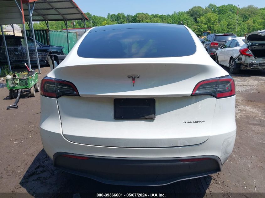 2023 Tesla Model Y VIN: 7SAYGDEF8PA048666 Lot: 39366601