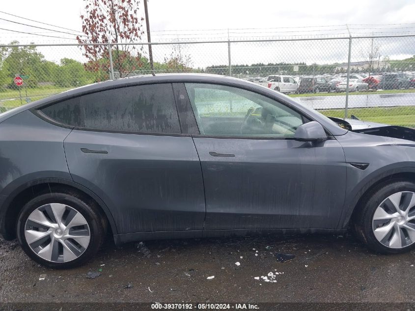 2023 Tesla Model Y Awd/Long Range Dual Motor All-Wheel Drive VIN: 7SAYGAEE3PF914234 Lot: 39370192