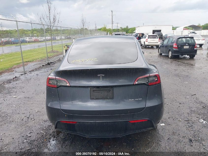 2023 Tesla Model Y Awd/Long Range Dual Motor All-Wheel Drive VIN: 7SAYGAEE3PF914234 Lot: 39370192