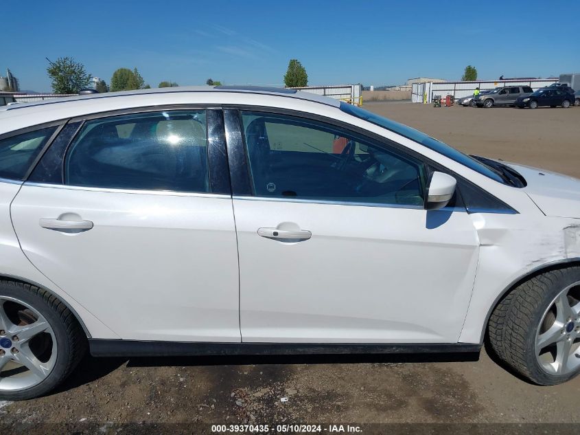 2014 Ford Focus Titanium VIN: 1FADP3N2XEL249958 Lot: 39370435