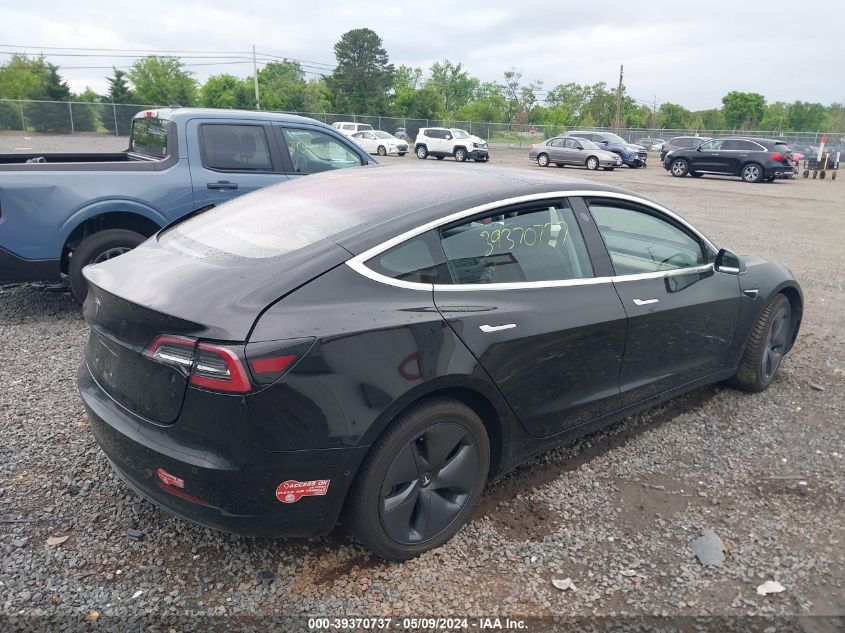 2018 Tesla Model 3 VIN: 5YJ3E1EAXJF033032 Lot: 39370737