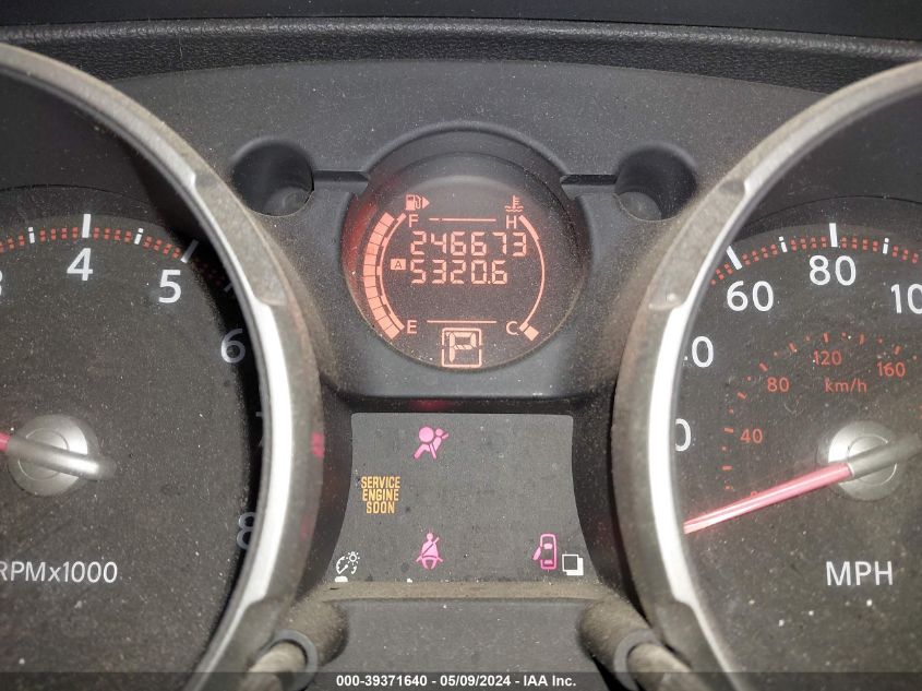 2009 Nissan Rogue S VIN: JN8AS58T39W325802 Lot: 39371640