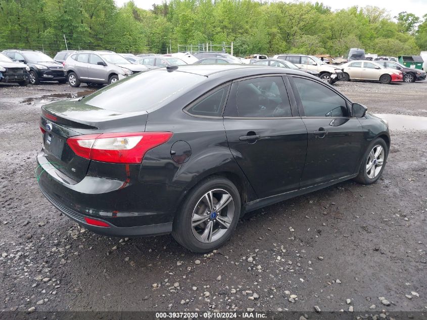 2014 Ford Focus Se VIN: 1FADP3F21EL114219 Lot: 39372030