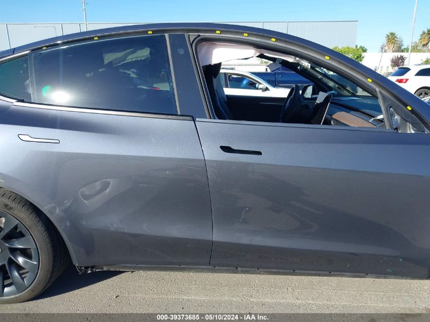 2023 Tesla Model Y Awd/Long Range Dual Motor All-Wheel Drive VIN: 7SAYGDEE5PF626538 Lot: 39373685