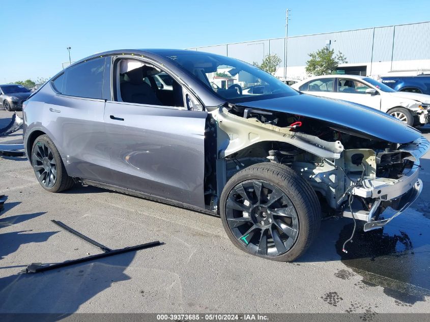 2023 Tesla Model Y Awd/Long Range Dual Motor All-Wheel Drive VIN: 7SAYGDEE5PF626538 Lot: 39373685