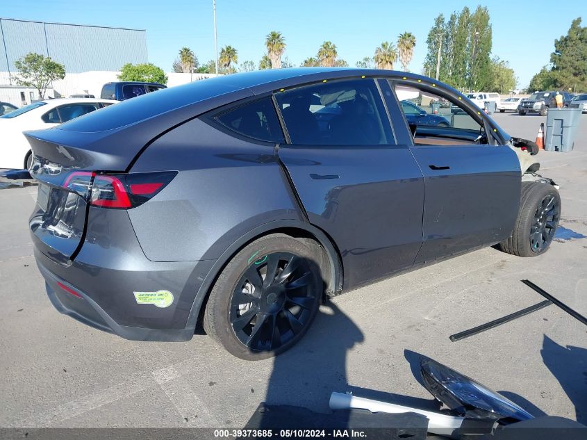 2023 Tesla Model Y Awd/Long Range Dual Motor All-Wheel Drive VIN: 7SAYGDEE5PF626538 Lot: 39373685