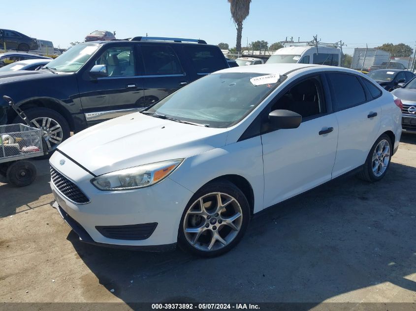 2015 Ford Focus S VIN: 1FADP3E21FL299973 Lot: 39373892