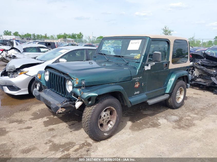 2000 Jeep Wrangler Sahara VIN: 1J4FA59S0YP723028 Lot: 39374974