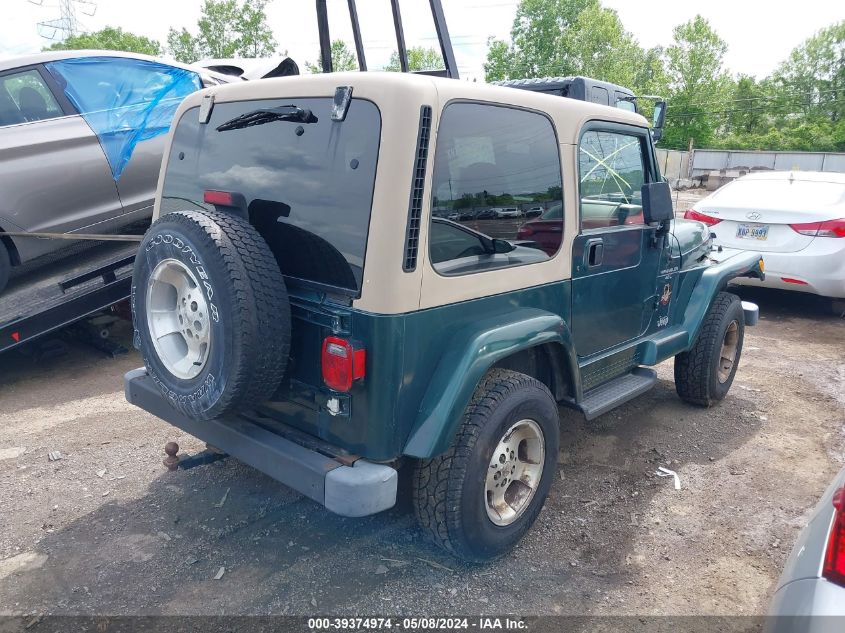 2000 Jeep Wrangler Sahara VIN: 1J4FA59S0YP723028 Lot: 39374974