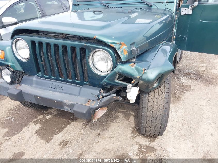 2000 Jeep Wrangler Sahara VIN: 1J4FA59S0YP723028 Lot: 39374974