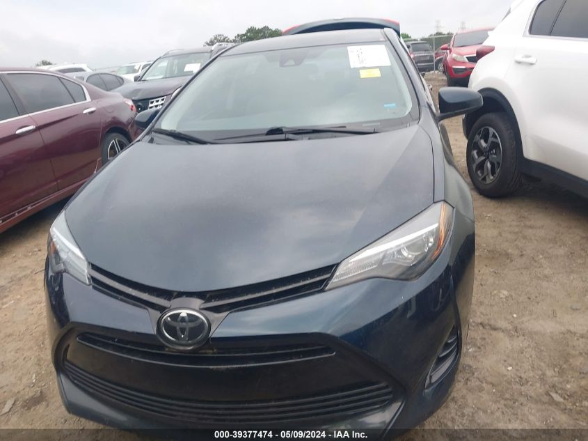 2018 Toyota Corolla Le VIN: 5YFBURHE3JP825250 Lot: 39377474