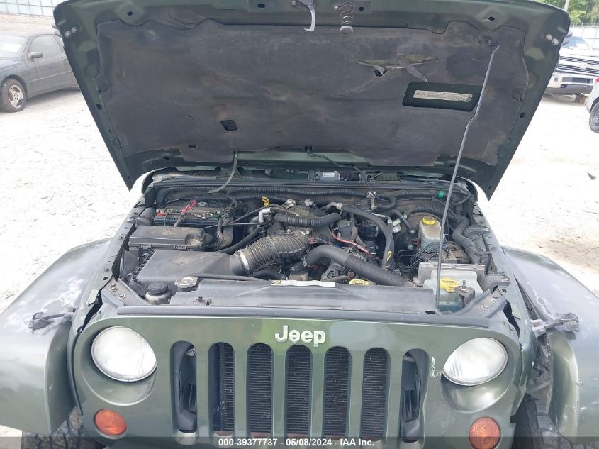 2009 Jeep Wrangler Unlimited Sahara VIN: 1J4GB59199L705418 Lot: 39377737