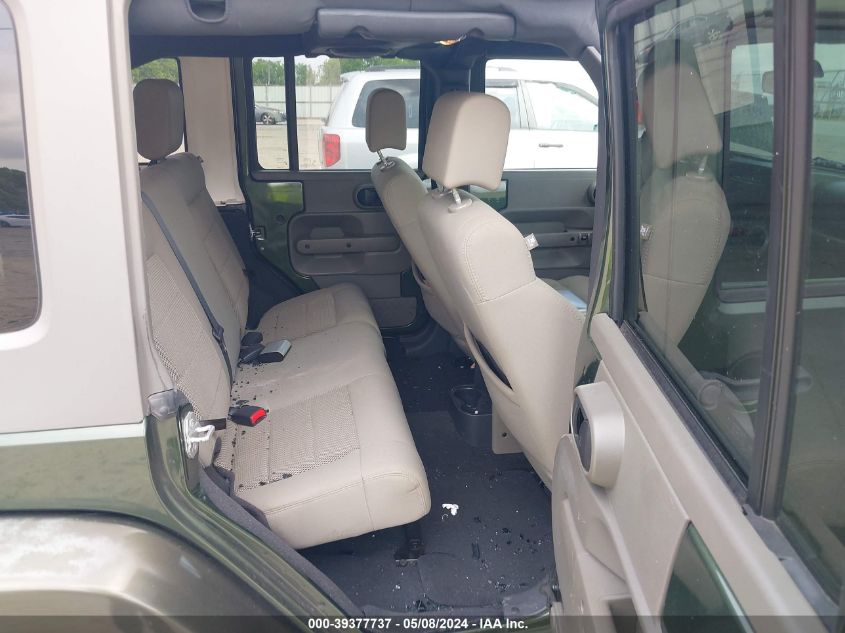 2009 Jeep Wrangler Unlimited Sahara VIN: 1J4GB59199L705418 Lot: 39377737