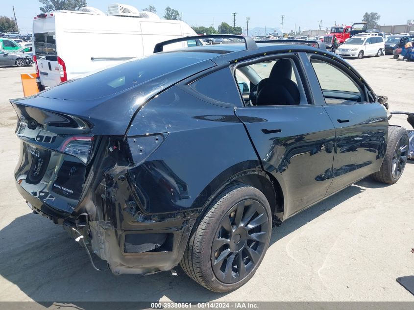 2023 Tesla Model Y Awd/Long Range Dual Motor All-Wheel Drive VIN: 7SAYGAEE0PF696138 Lot: 39380861