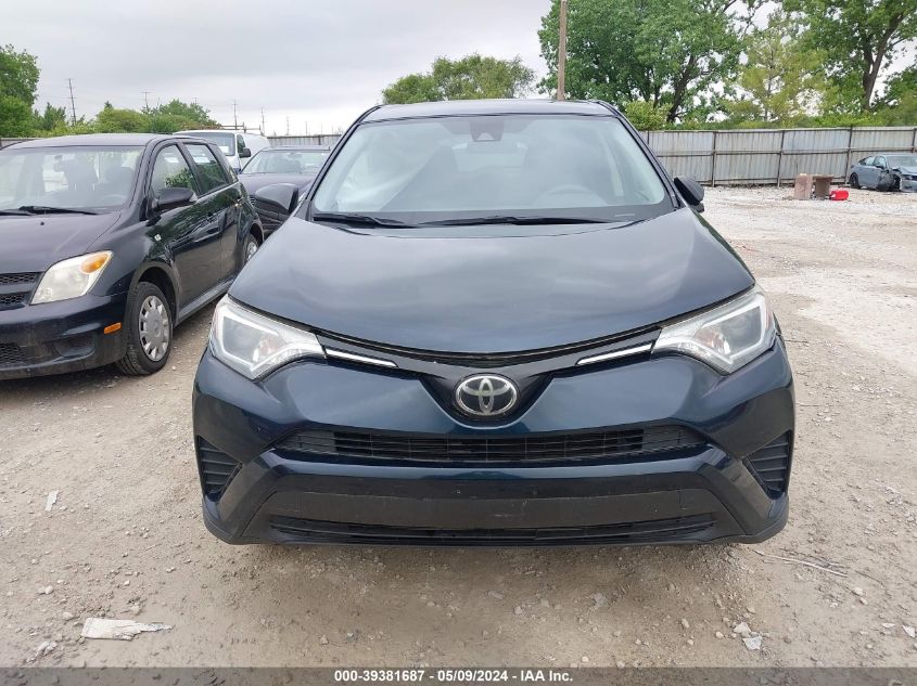 2017 Toyota Rav4 Le VIN: JTMBFREV3HJ713304 Lot: 39381687