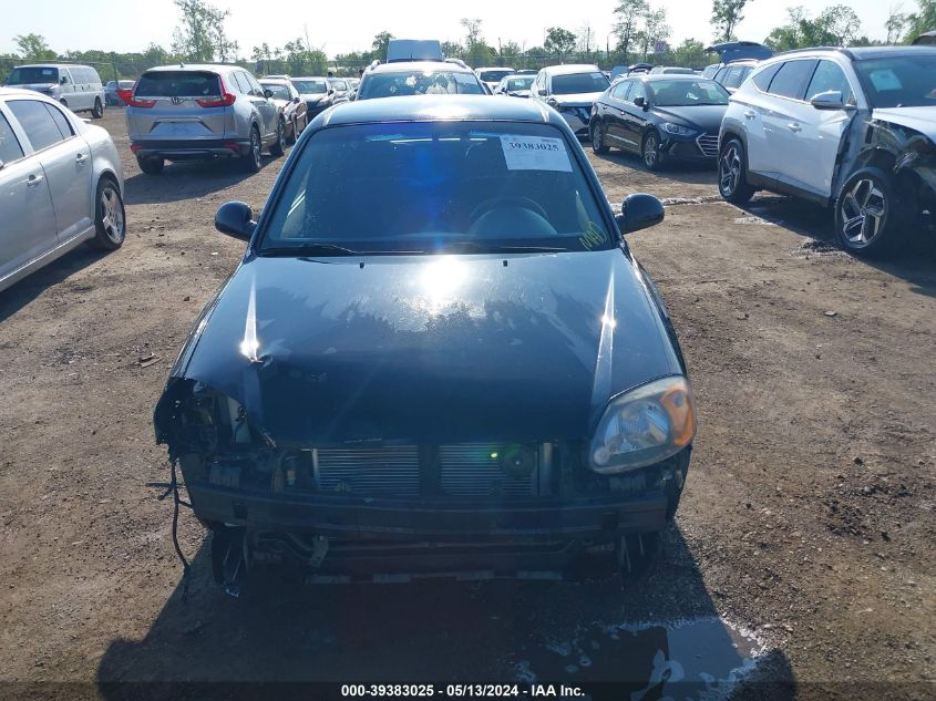 2005 Hyundai Accent Gls/Gt VIN: KMHCG35C65U362018 Lot: 39383025