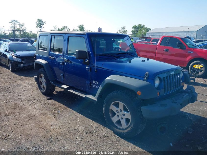 2009 Jeep Wrangler Unlimited X VIN: 1J4GA39199L718614 Lot: 39384620