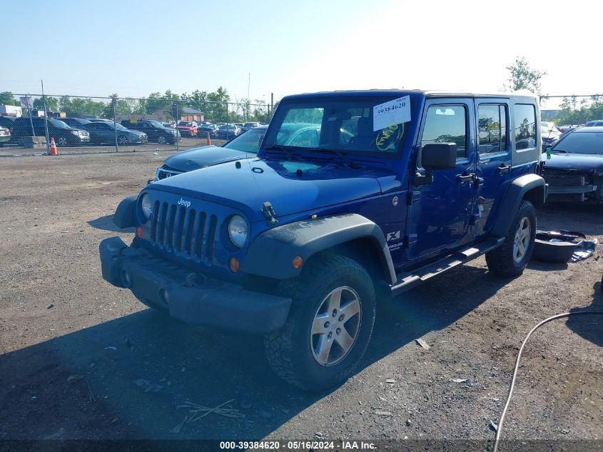 2009 Jeep Wrangler Unlimited X VIN: 1J4GA39199L718614 Lot: 39384620