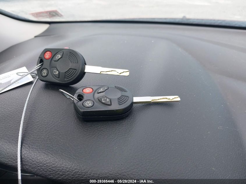 2014 Ford Focus Se VIN: 1FADP3F22EL458576 Lot: 39385446