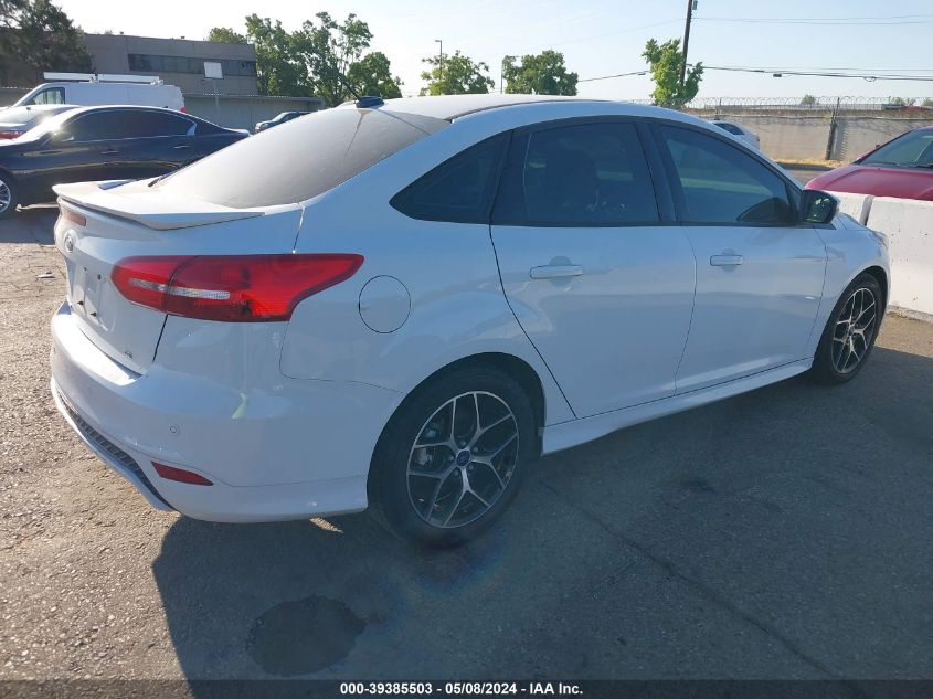 2016 Ford Focus Se VIN: 1FADP3F23GL392204 Lot: 39385503